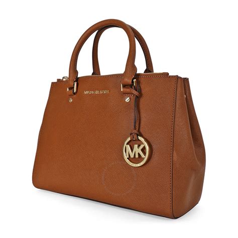 michael kors tasche ledergeruch|Michael Kors opened satchel purse.